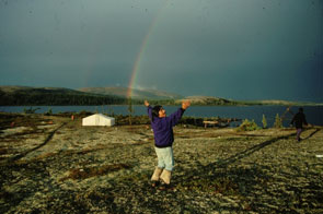 Prote Pokue before a wonderful rainbow at Ushpuakaniss. Photo courtesy Kanishte Poker.