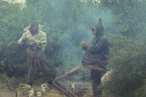 Tuma Noah and Shimun Poker caribou hunting by boat up Nutakuanan-shipu. Photo courtesy Georg Henriksen.