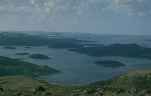 Innu camping area in the cove, lower left at Uipat Utshimassit. Photo courtesy Georg Henriksen.