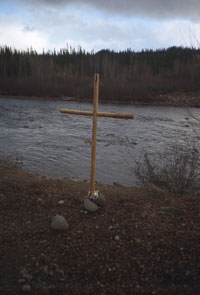 The cross marks the location at Uapushkakamau-shipu where the late Munik Pone's ashes were placed in the river. Photo courtesy Peter Armitage.
