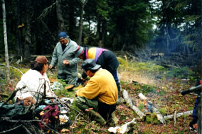 Bernice Penashue, Ishpashtien Penunsi, Pinamen Penunsi, Edmund Benuen having lunch at Mashku-nipi. Photo courtesy Fred Schwarz.